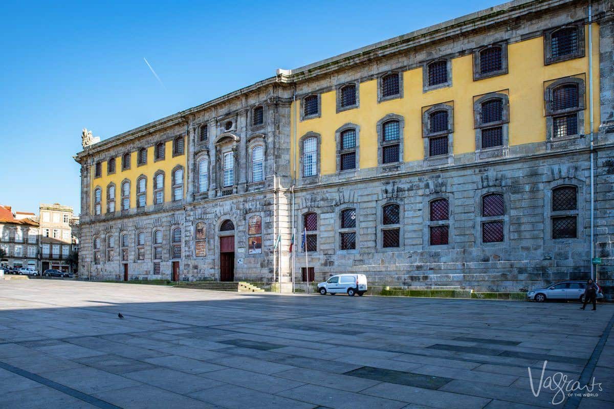 Yellow painted building that houses the photography museum in Porto.