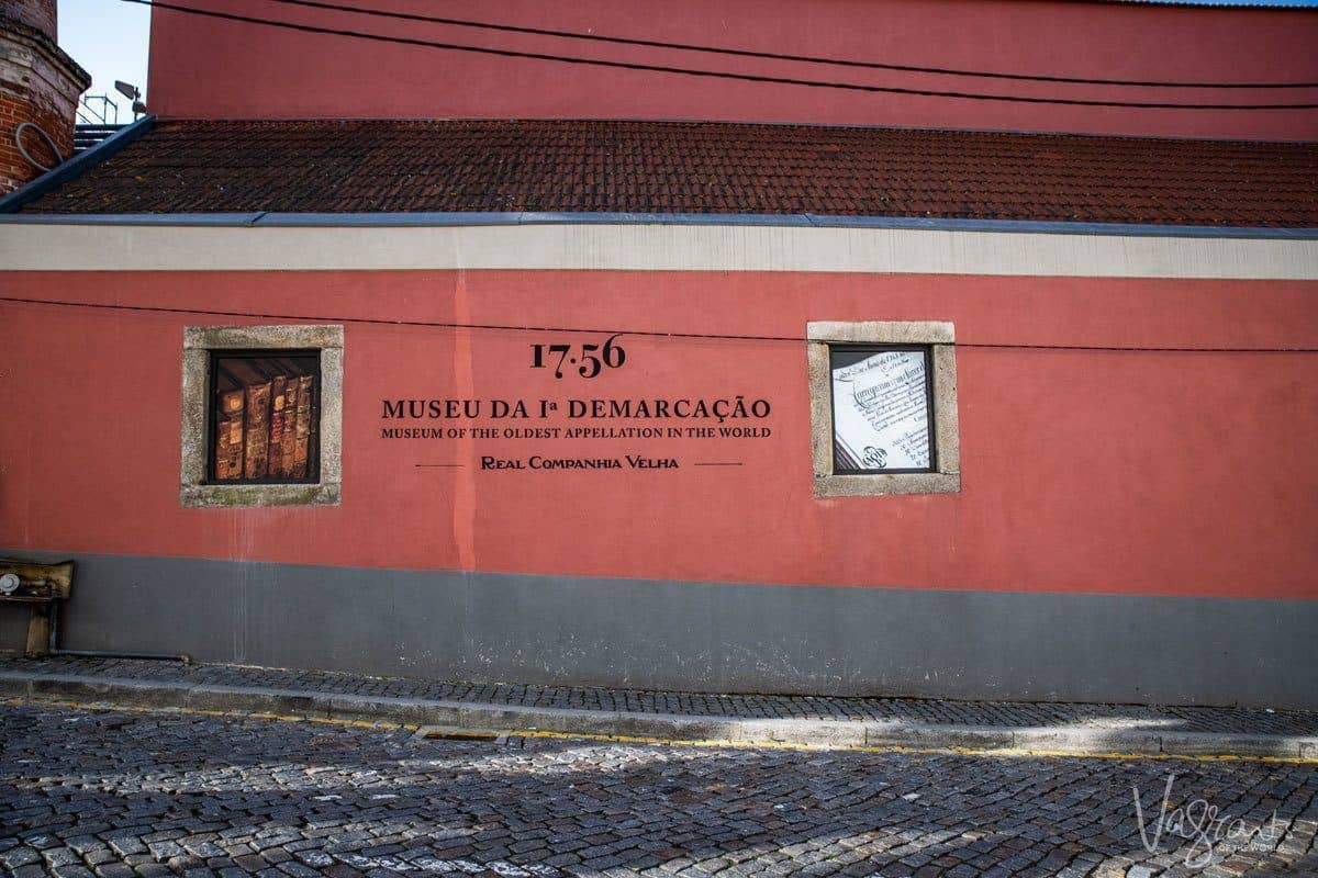 Pink building housing the 1756 port museum, a main attraction in Porto.