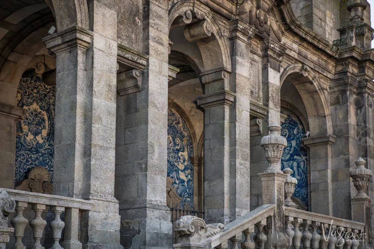 Stone steps and blue and white azulejo tiles at the entrance to Porto Cathedral.