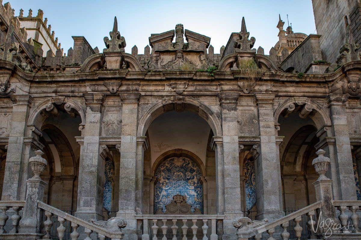 Stone stairways winding up to the grand entrance of Porto Cathedral. 