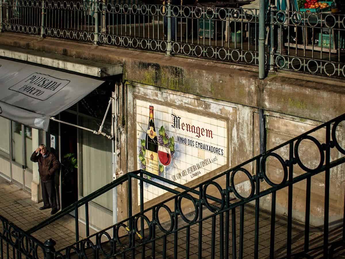 Man scratching his head at Mercado do Bolhao,Porto.