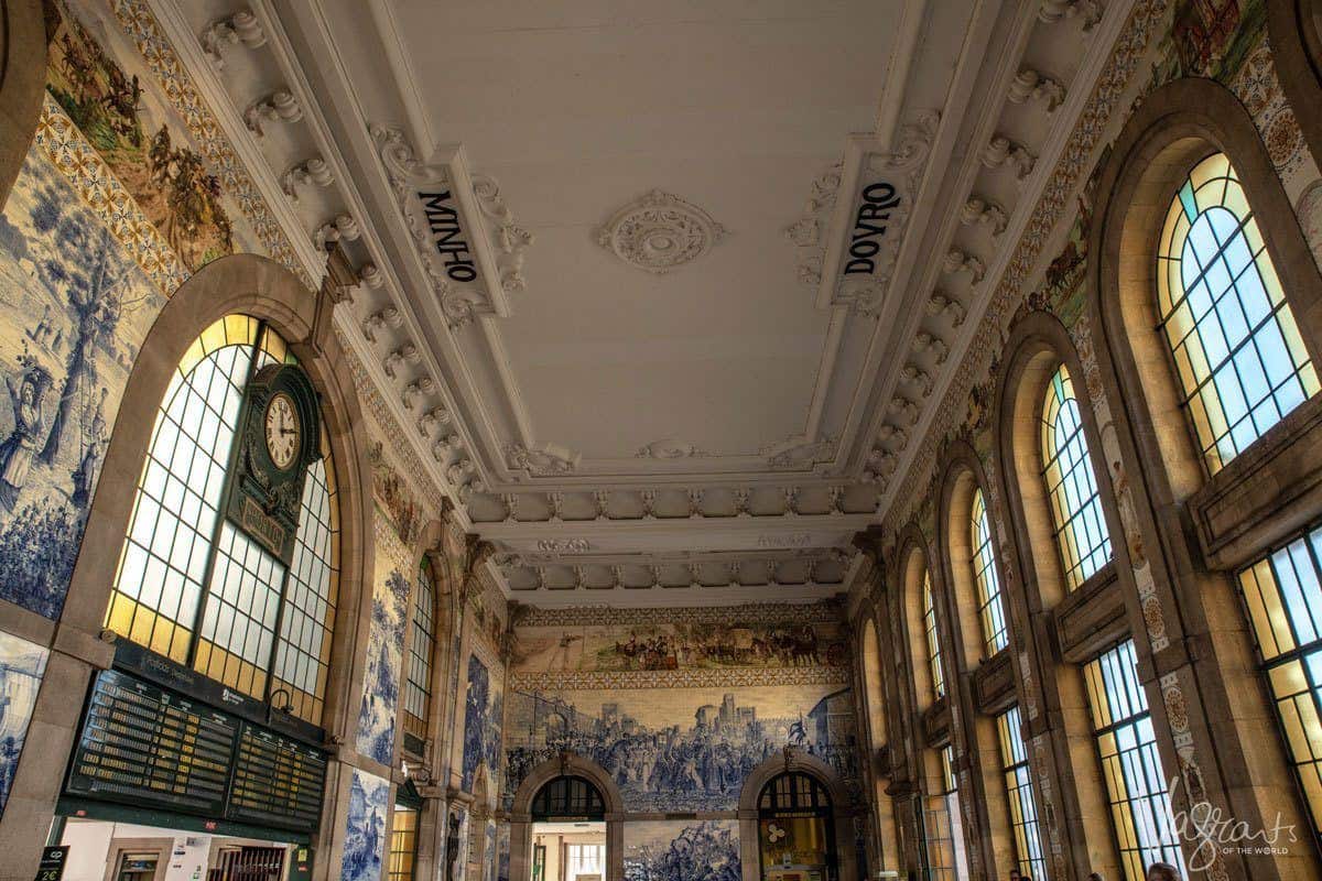 White ceiling and lead light windows of the arrivals hall at Sao Bento Train Station. 