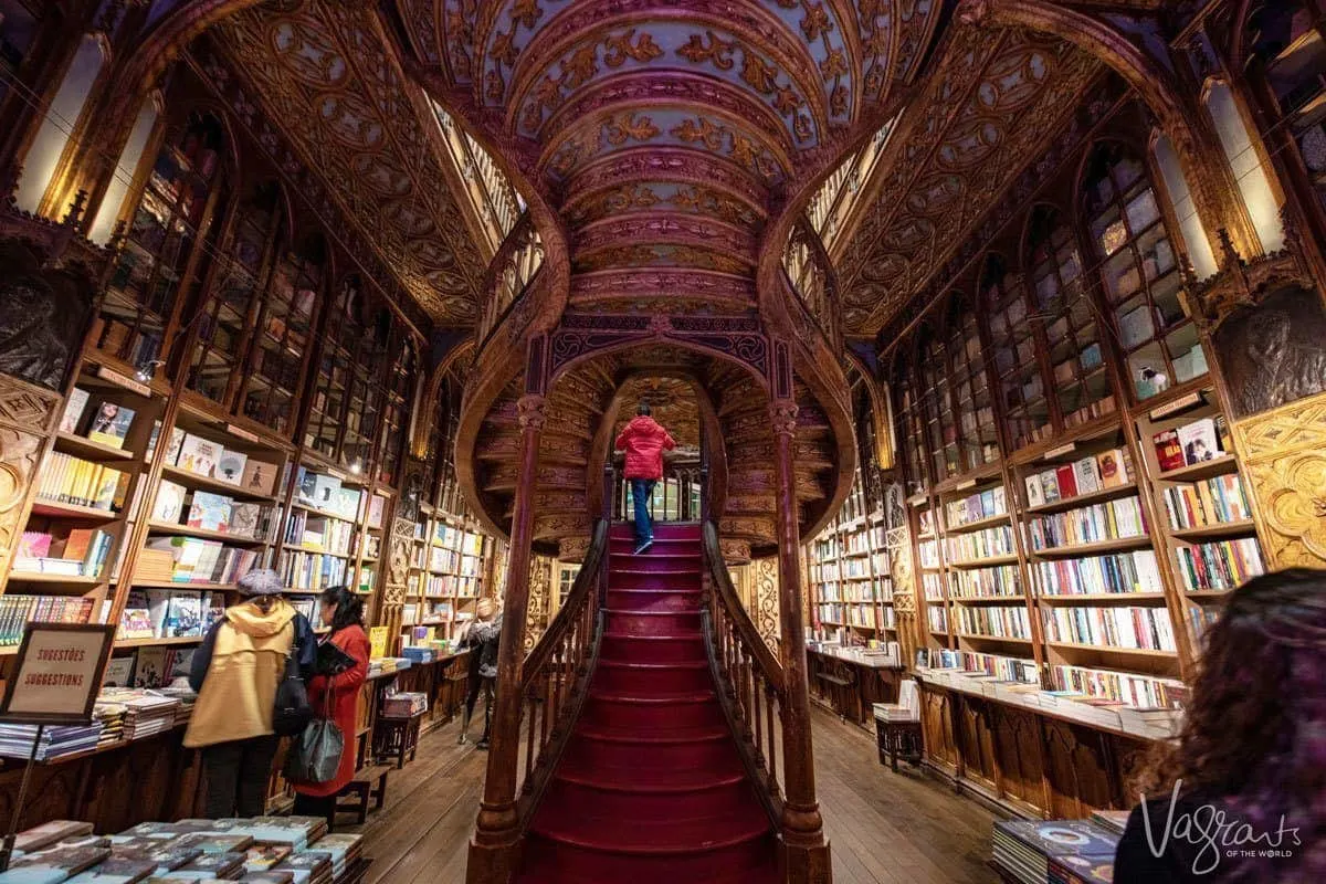 
The ornate and whimsical interior of the Livraria Lello bookshop in Porto that inspired Harry Potter. 
