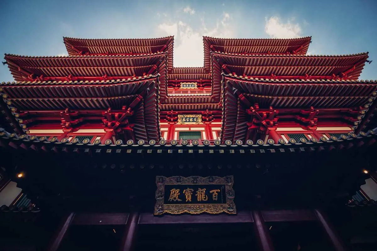 Symmetrical towers of a red and purple pagoda. 