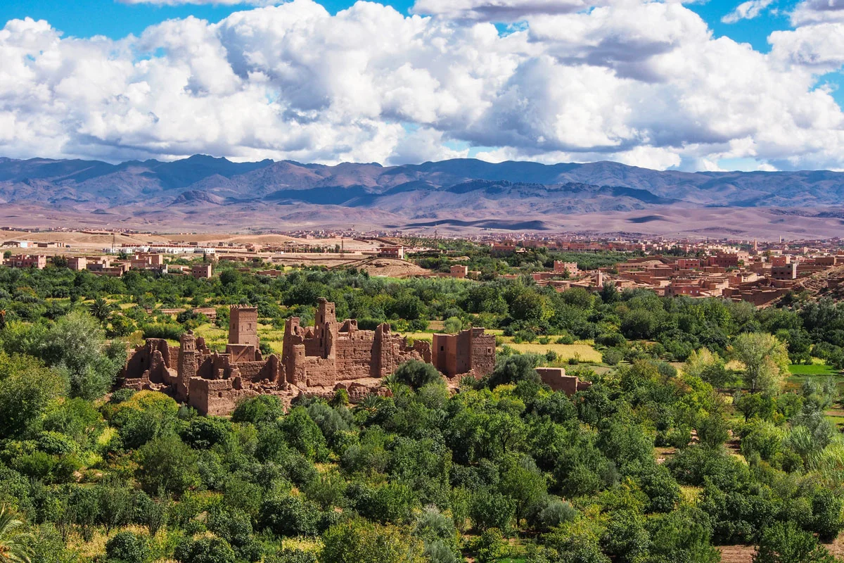 Overlooking the fertile valley of Ouarzazate Morocco with mud brick Kasbahas.
