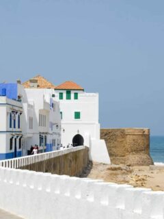The white washed buildings overlooking the beach in Asilah Morocco.