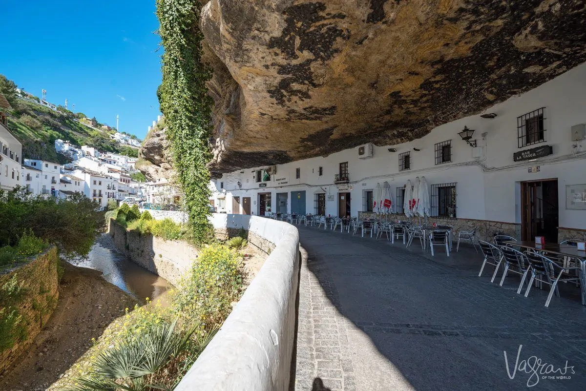 white houses and shop under overhanging rock in Setenil de las Bodegas. 