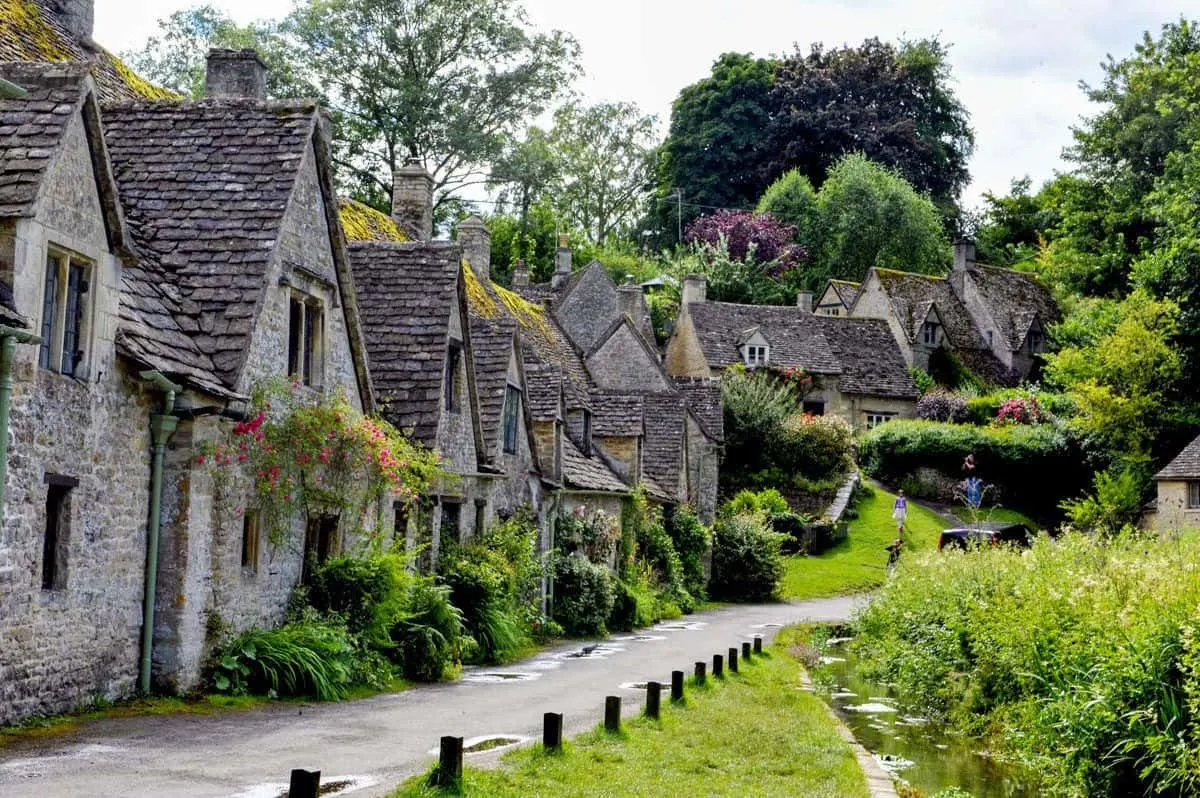 a row of stone houses with old tiled roofs in a country village.  Wales is a great location for on foot holidays UK