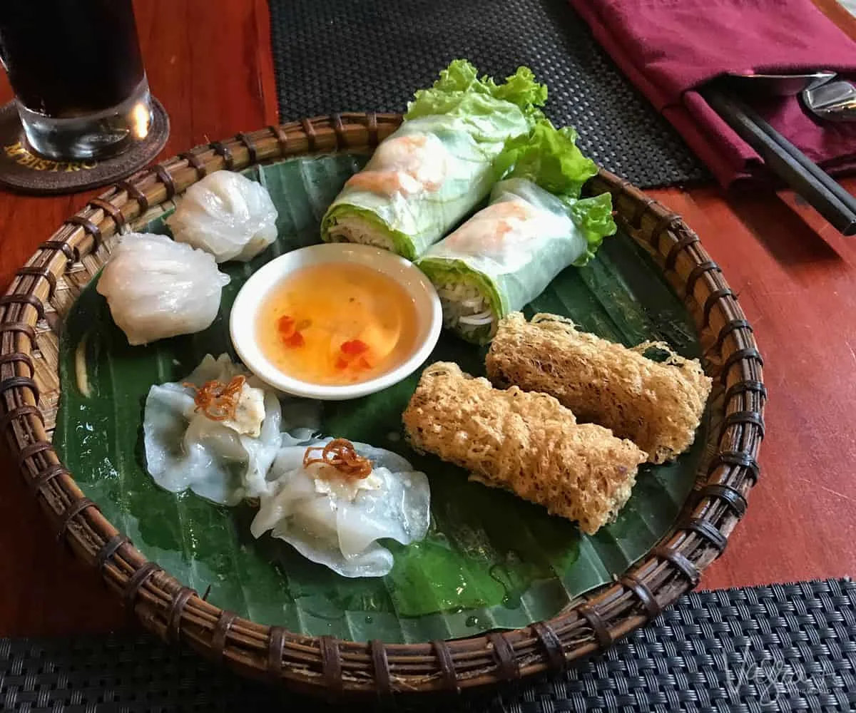 Vietnamese spring rolls and sauce which you can learn to make yourself with a Vietnamese cooking course in Hanoi Vietnam.
