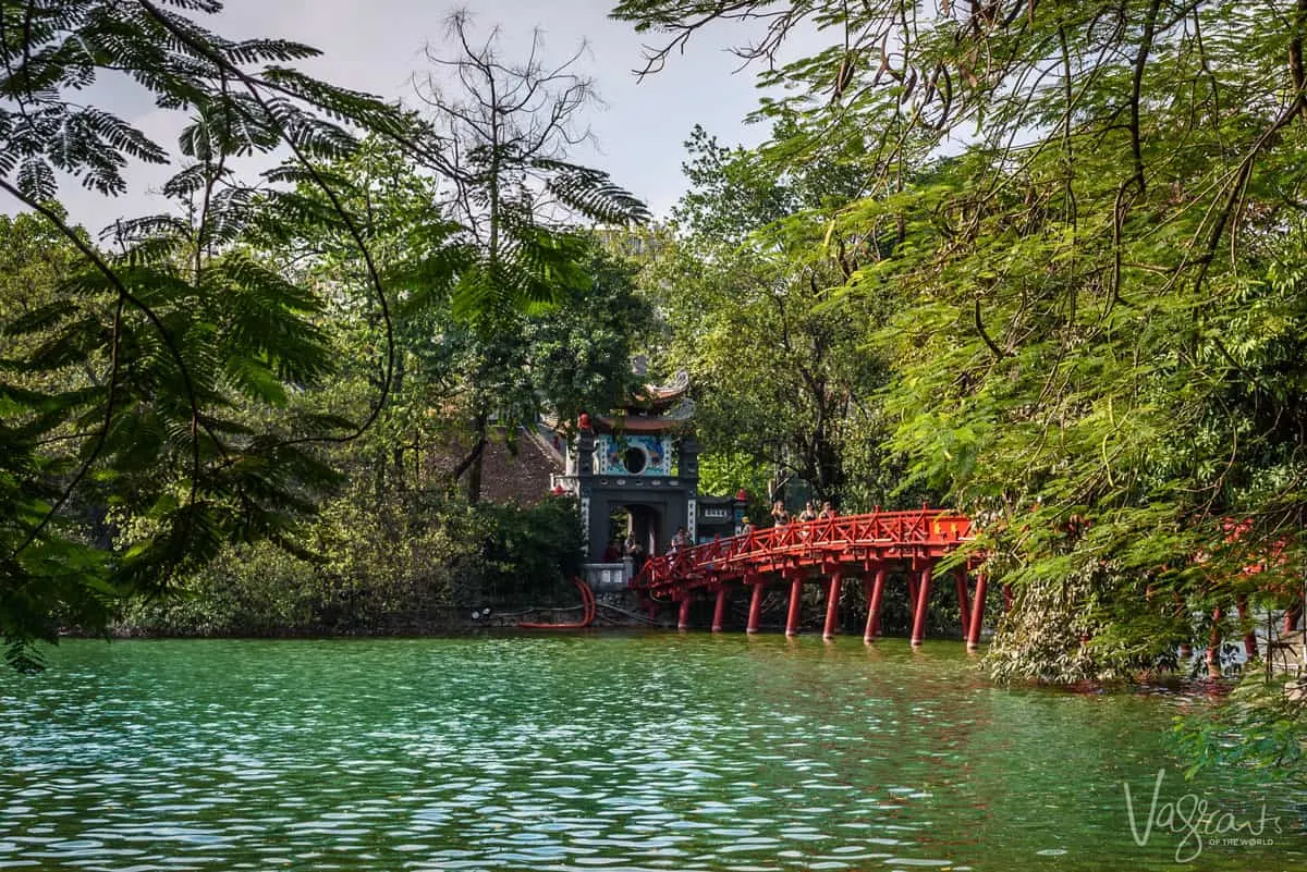 Red bridge leading to temple on Turtle Lake. 