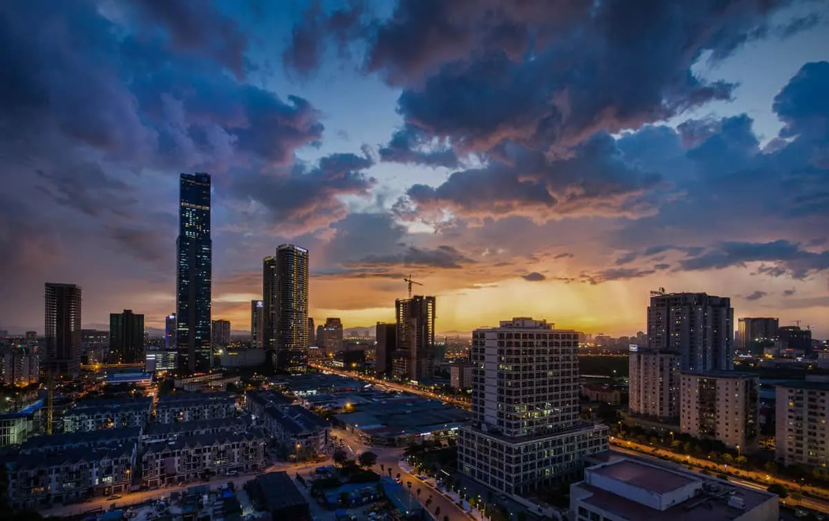 night sky, buildings and dramatic cloud formations in Hanoi