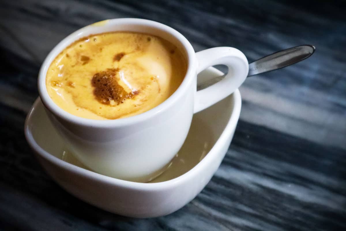 A cup of egg coffee, looking for the best food and drink in Hanoi then start with this traditional egg coffee.