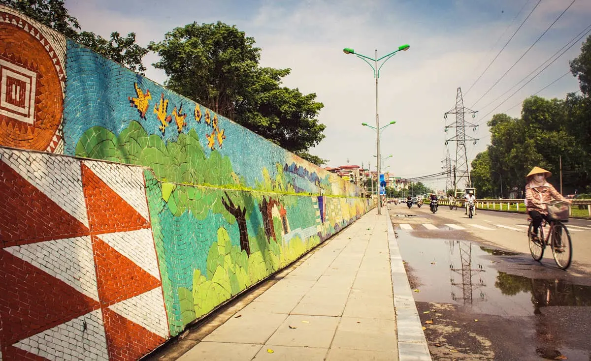 Pictures made from ceramics along the side of Ceramic Road, Hanoi Vietnam. Looking for non touristy things to do in Hanoi then do not miss this little treat.