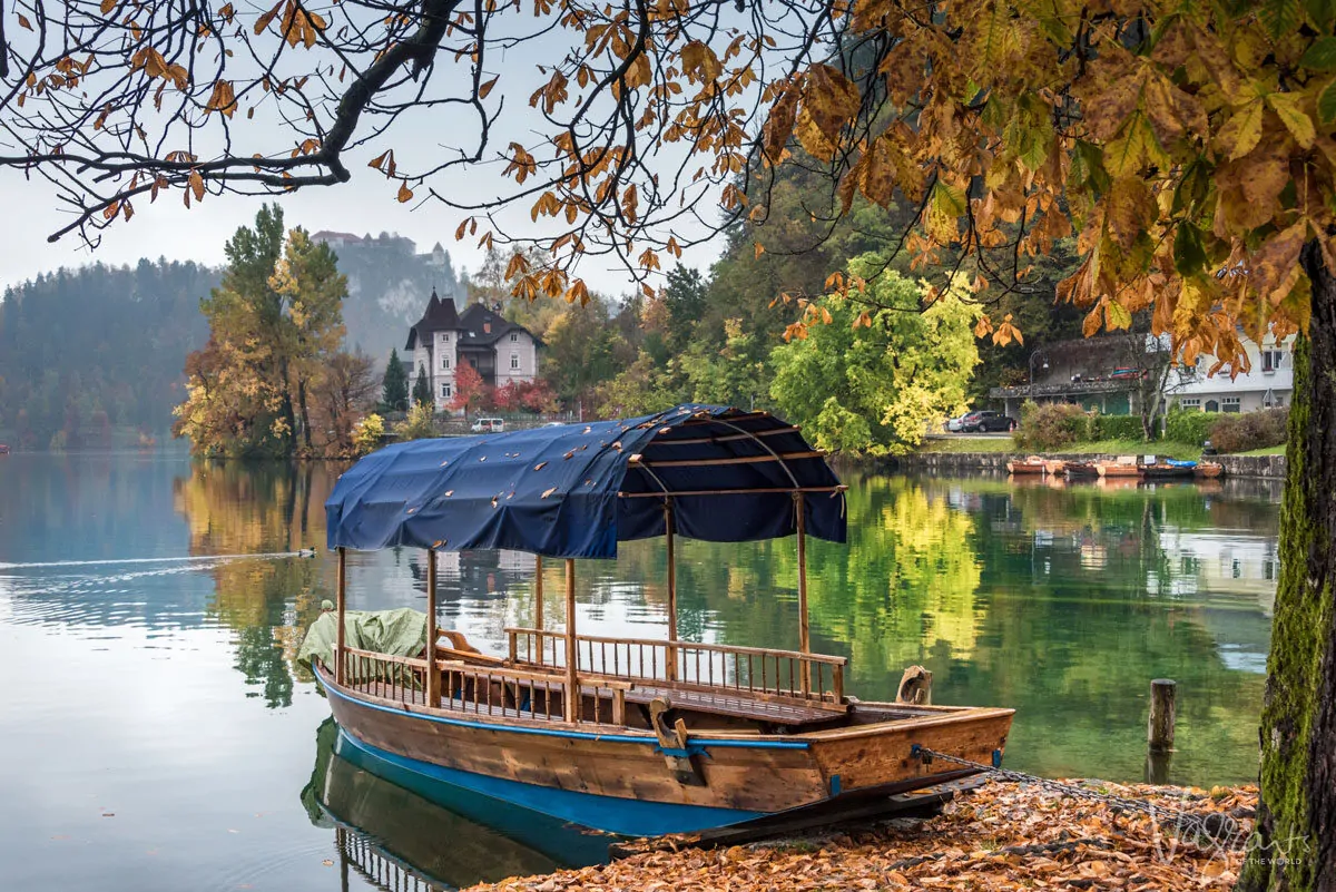 A traditional Pletna boat on the banks of Lake Bled in Slovenia in autumn.
