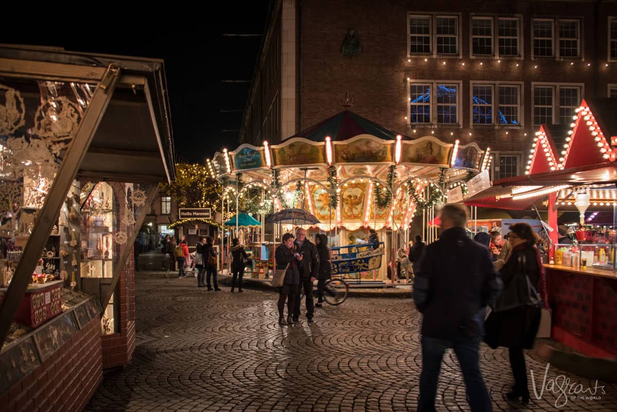 Brightly lit Christmas stalls at the Dusseldorf Christmas markets.