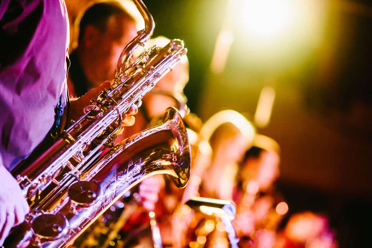 Close up of instruments and Jazz musicians in a concert. if you are looking for free things to do in Miami, MOCA offers free jazz concerts on the last Friday of the month