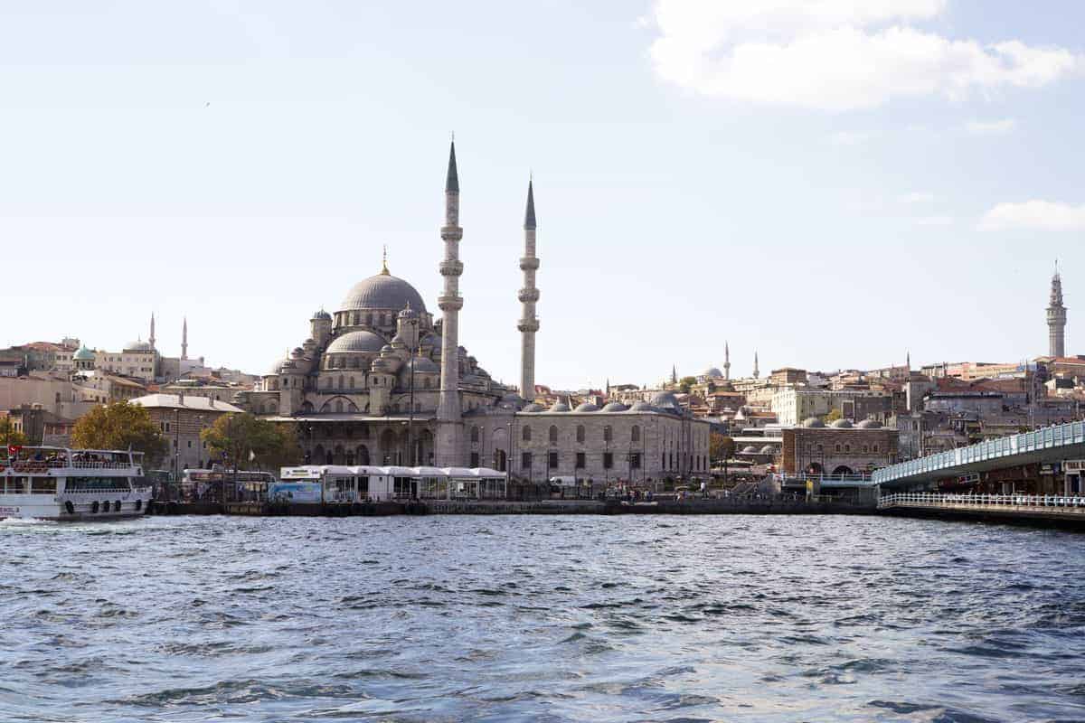 Mosque and Spires in Istanbul and ferries crossing the Bosporus