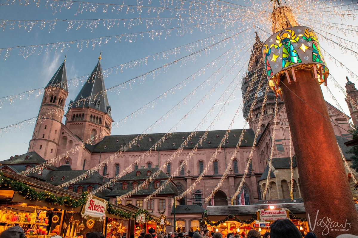 Looking up at the Mainz cathedral with the Christmas markets in the foreground. One of tht stops on the Paris to Swiss Alps cruise with Viking Cruises