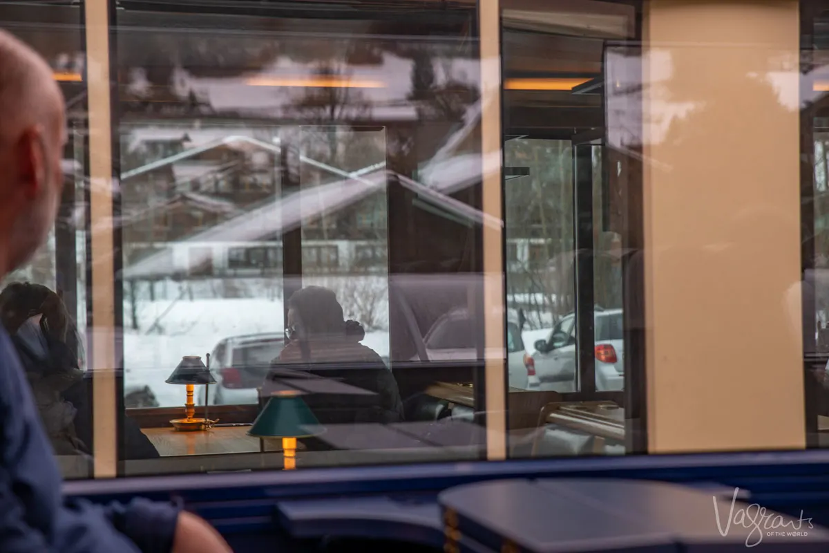 Passing panoramic train windows on the Golden Pass Line.