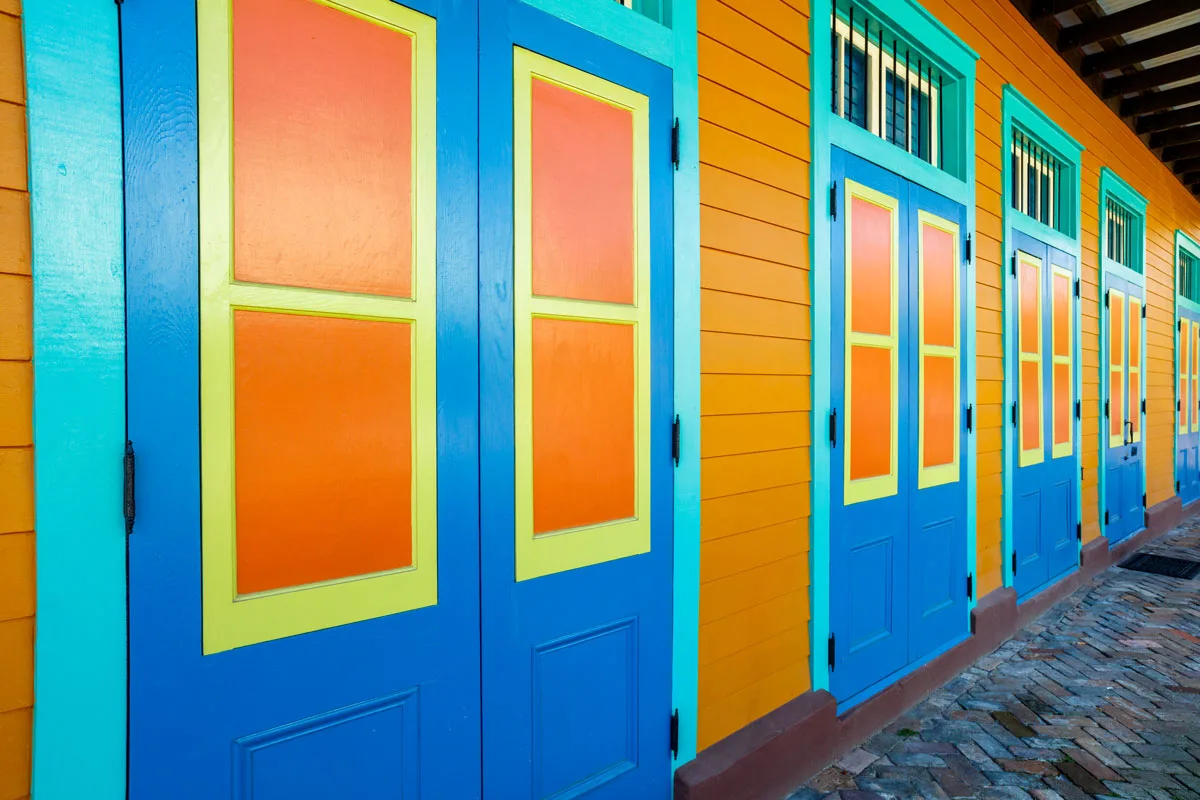 Brightly painted buildings in Marigny district, one of the best places to stay in New Orleans