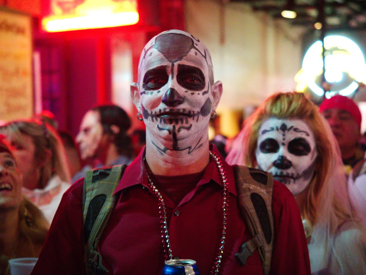 Man with face painted like a skeleton for Halloween celebrations in New Orleans