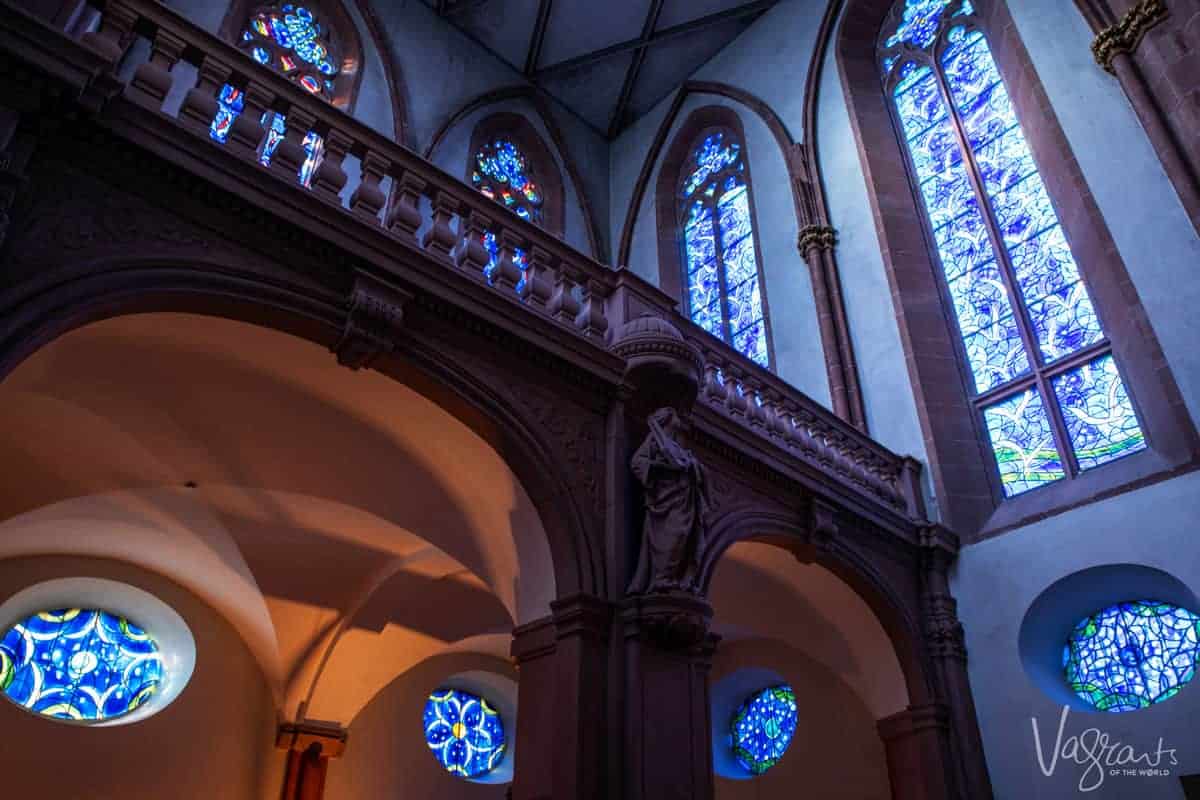 Inside St Stephen's Church in Mainz Germany - Marc Chagall's famous blue stained glass windows. One of the optional shore excursions on a Rhine river cruise from Paris to the Swiss Alps