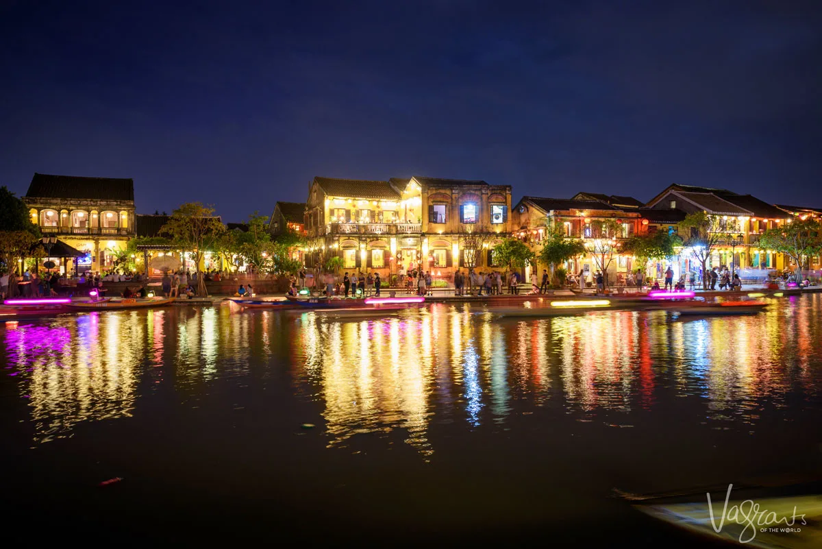 Watching the lanterns on the river boats is a popular thing to do in Hoi An at night.