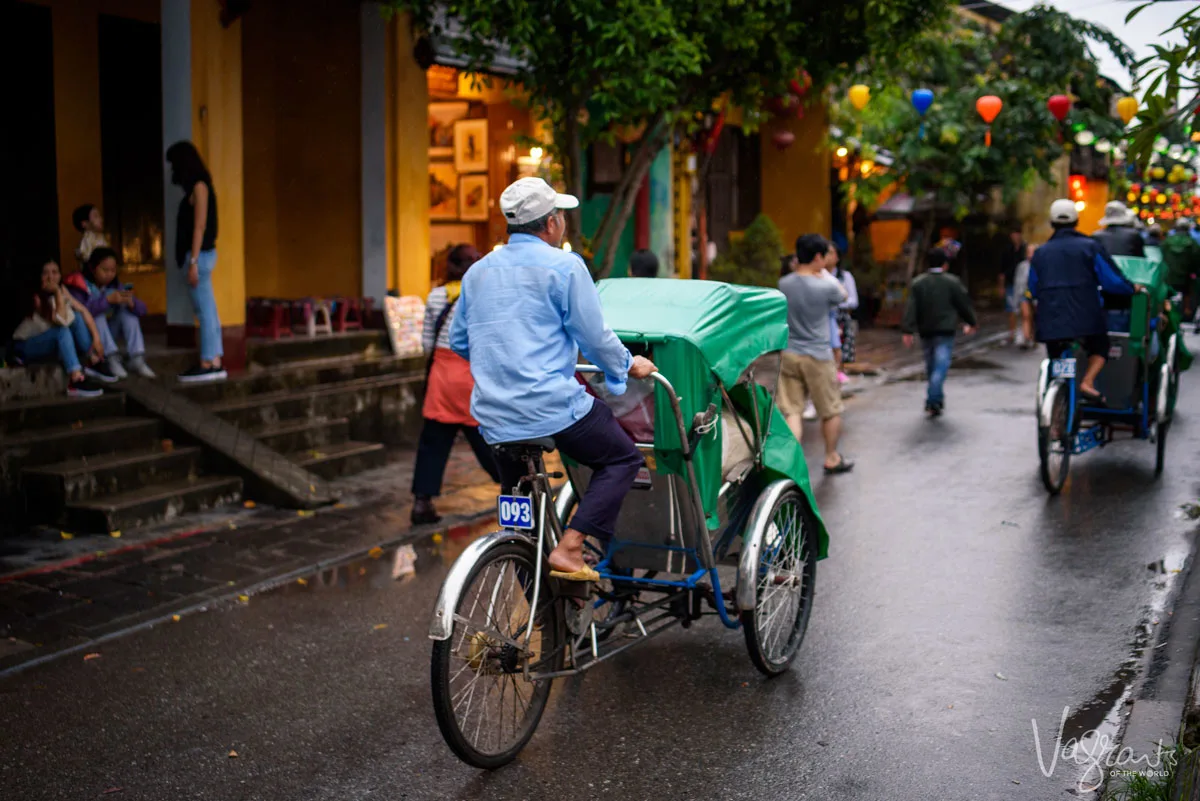 Man riding cyclo cab in Hoi An Old Town