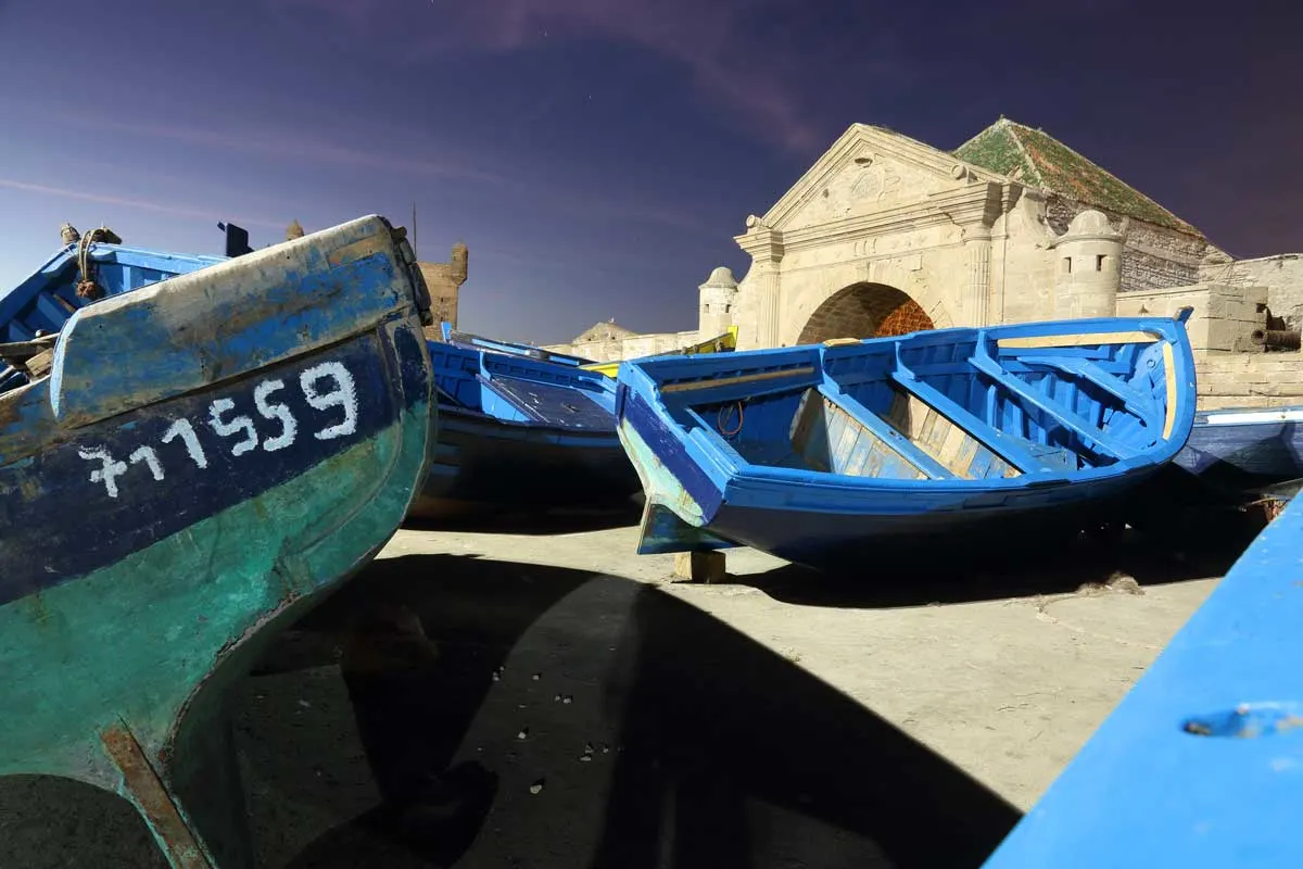 Typical blue fishing boats of Essaouira, a bohemian coastal town in Morocco