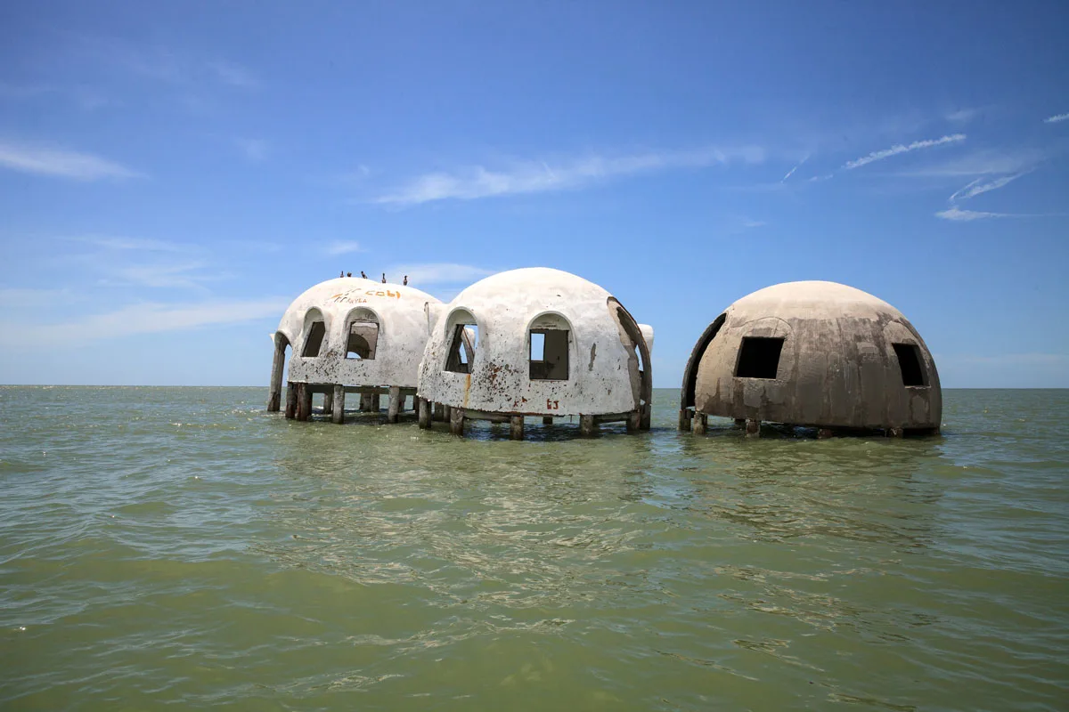 Blue sky over the Cape Romano dome house ruins in the Gulf Coast of Florida.