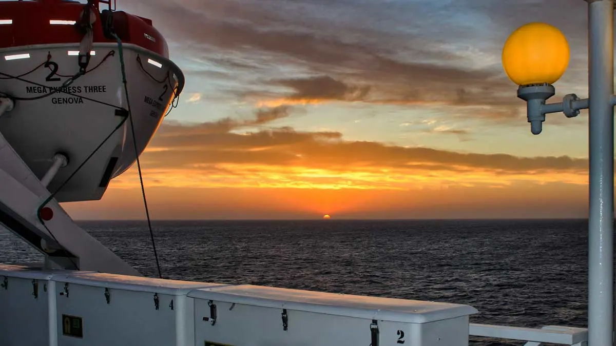 Sunset over the water from the deck of a ferry travelling to Sardinia. 