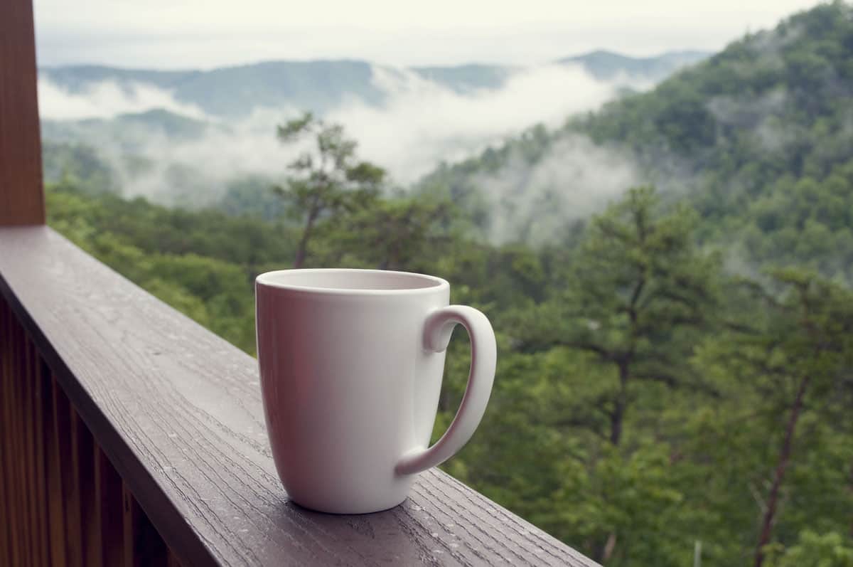 coffee on a mountainside thanks to a portable coffee maker.