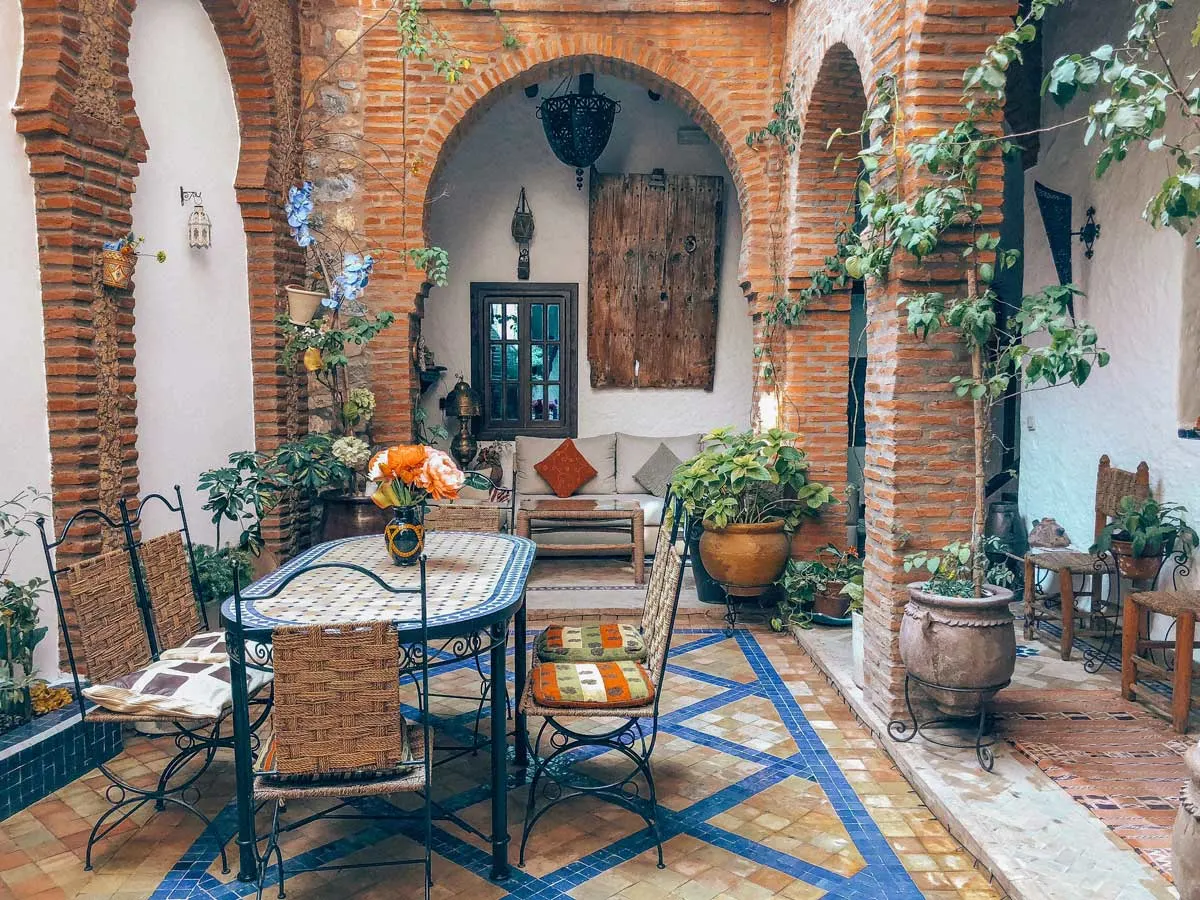 Metal and tiled dining area inside a Riad.