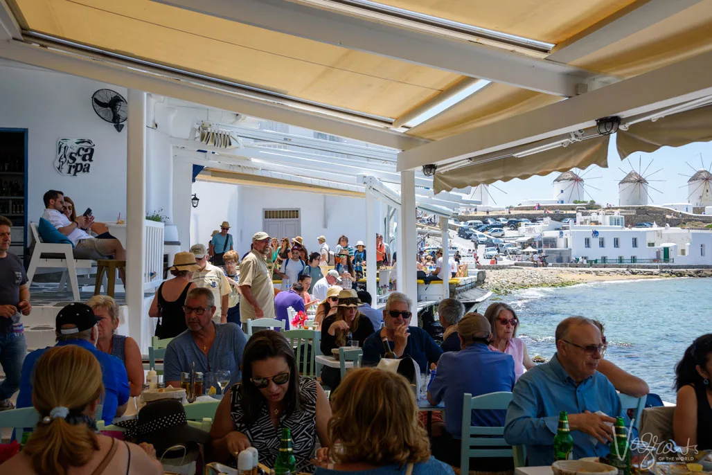 Restaurants on the water packed with tourists.