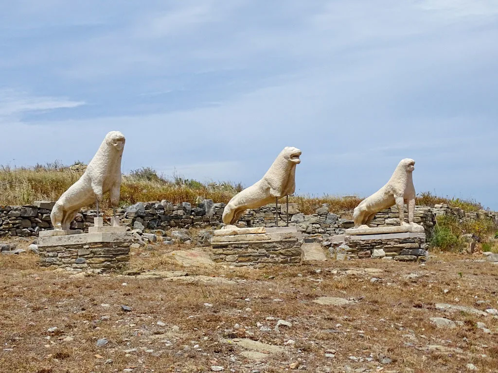 Sacred lake of Delos guarded by 3 white marble lions on Mykonos.