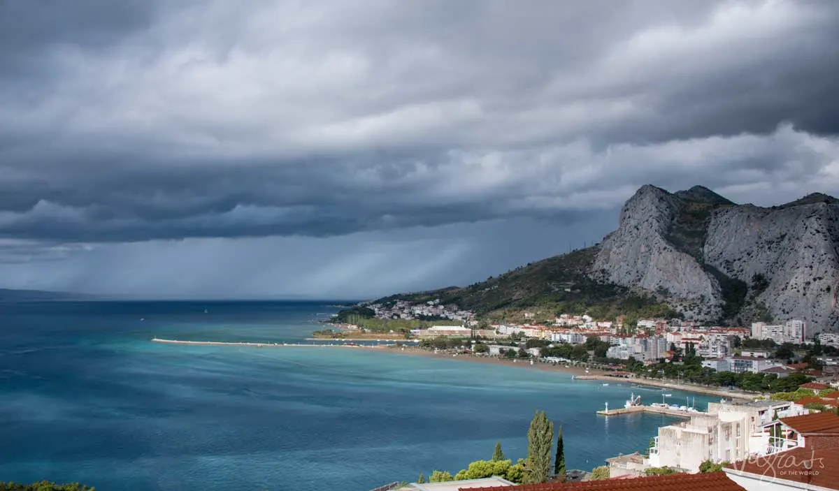 Pirate town of Omis under a dark and stormy sky.