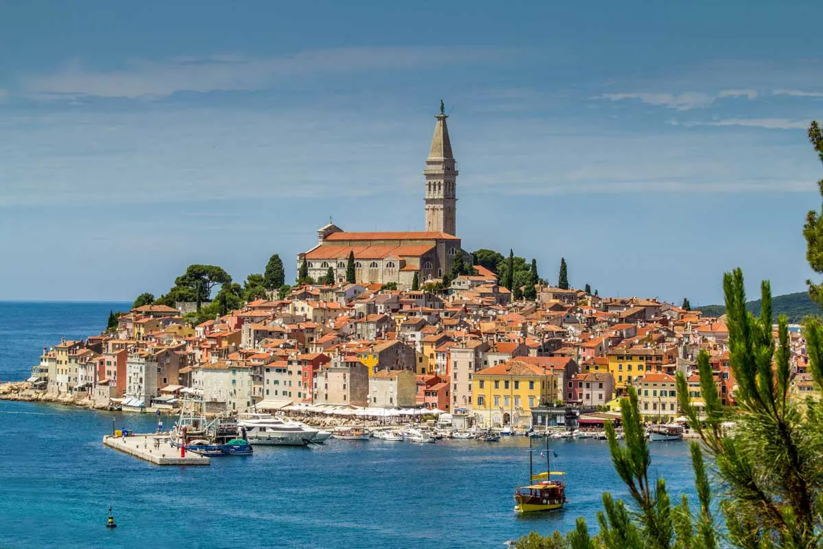 Bustling harbour and old town of Rovinj, Croatia.