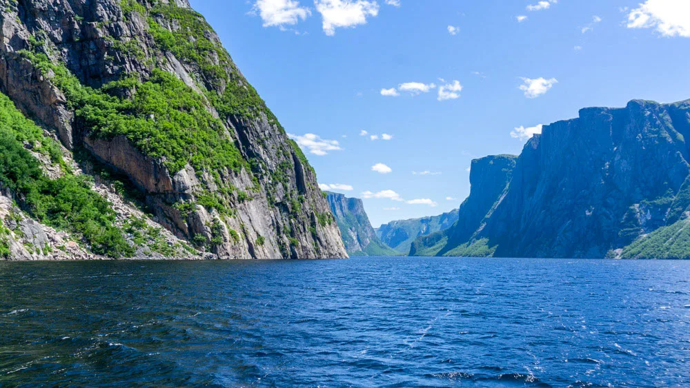 Mountains disappear into the lake at Gros Morne.