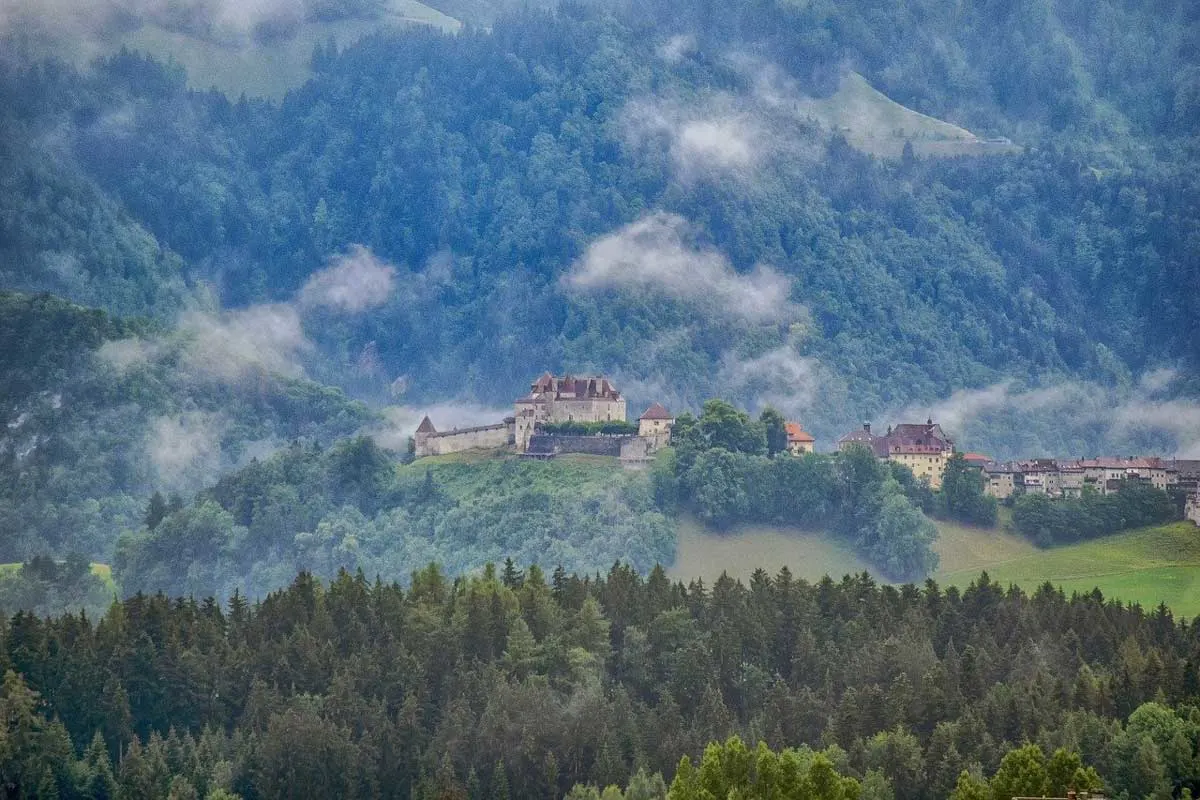 Not Gruyere cheese but the misty medieval Gruyere Castle