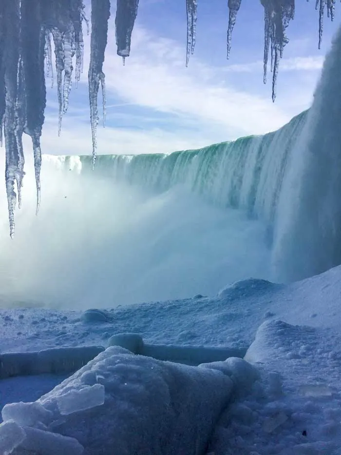 Brave the icy waters for the unique experience to  journey behind the falls, which is open all year but maybe at its best in winter.