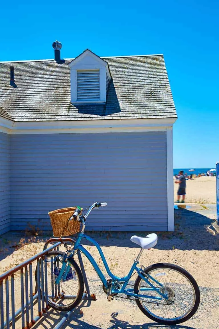 Blue bike parked at the beach at Craigville Beach Cape Cod