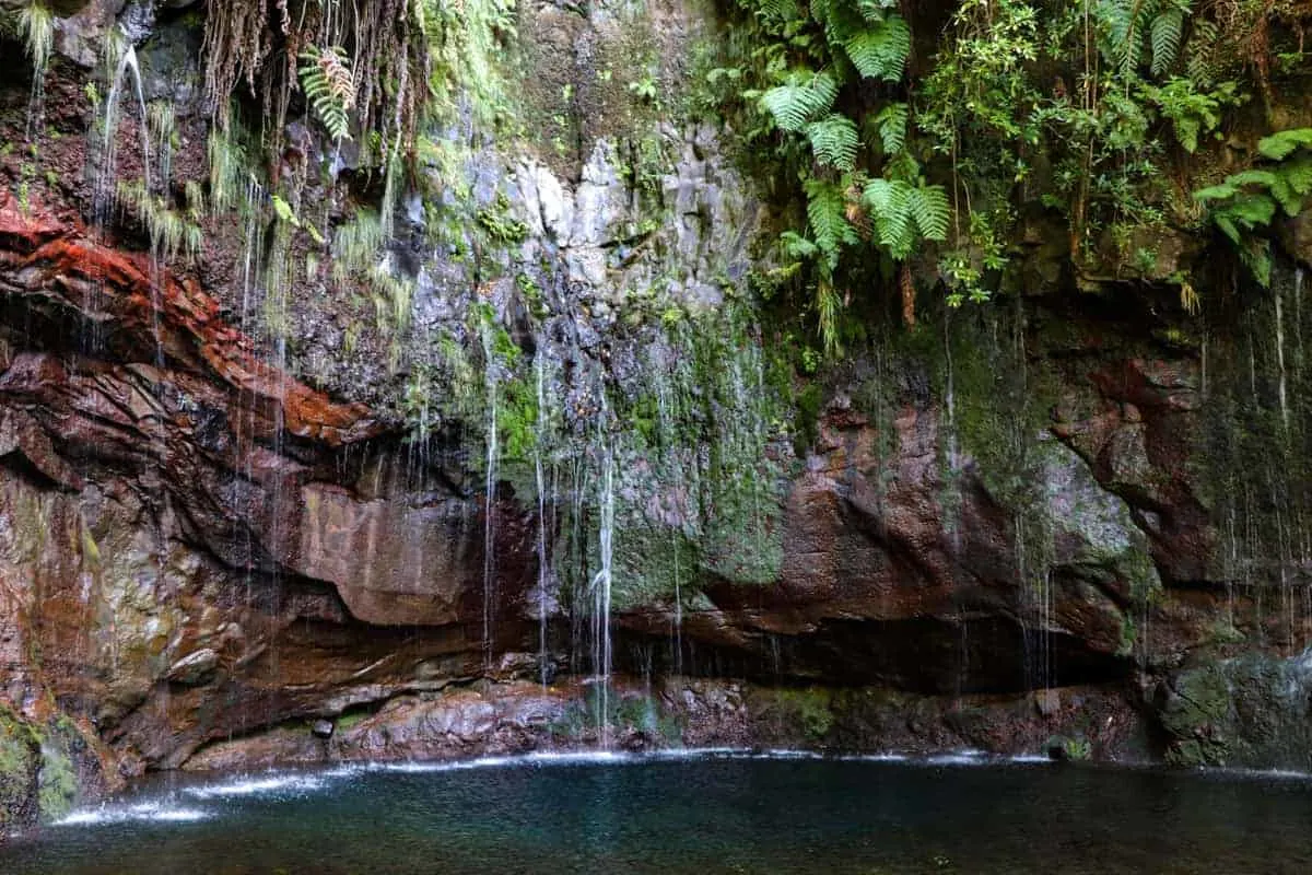 Waterfall over a lagoon on Madeira Island Portugal.