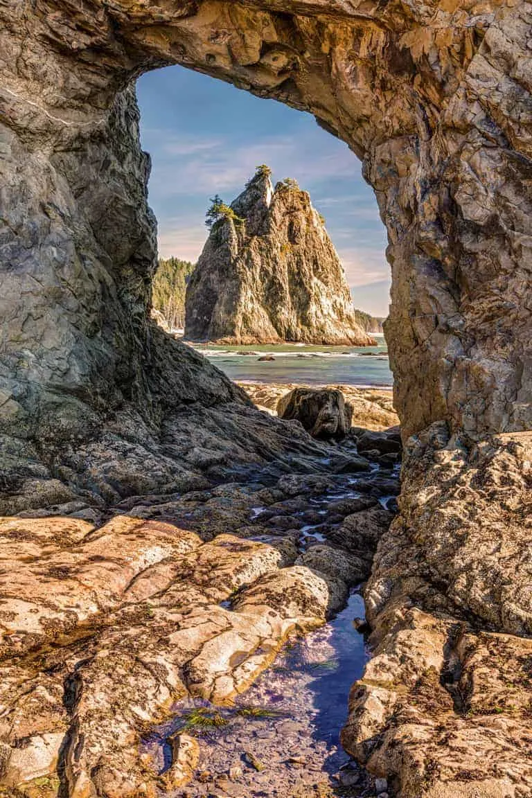 Peering through a sea cave in Olympic National Park.