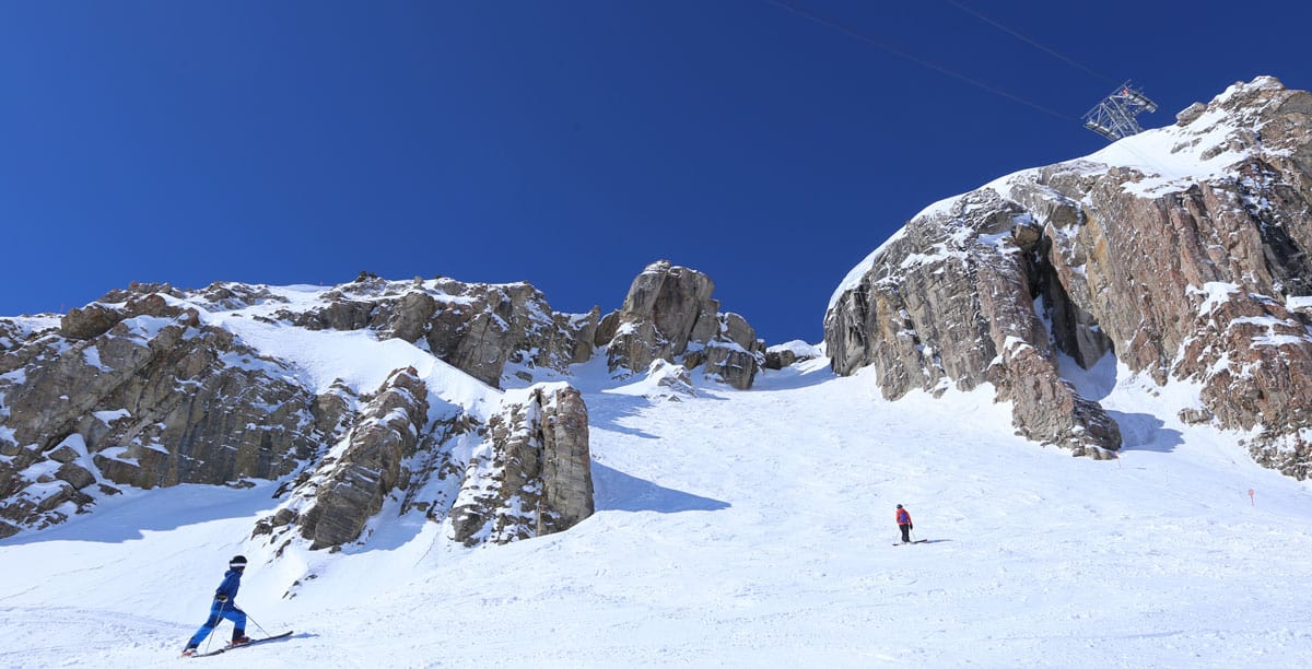 Two people skiing in Jackson Hole.