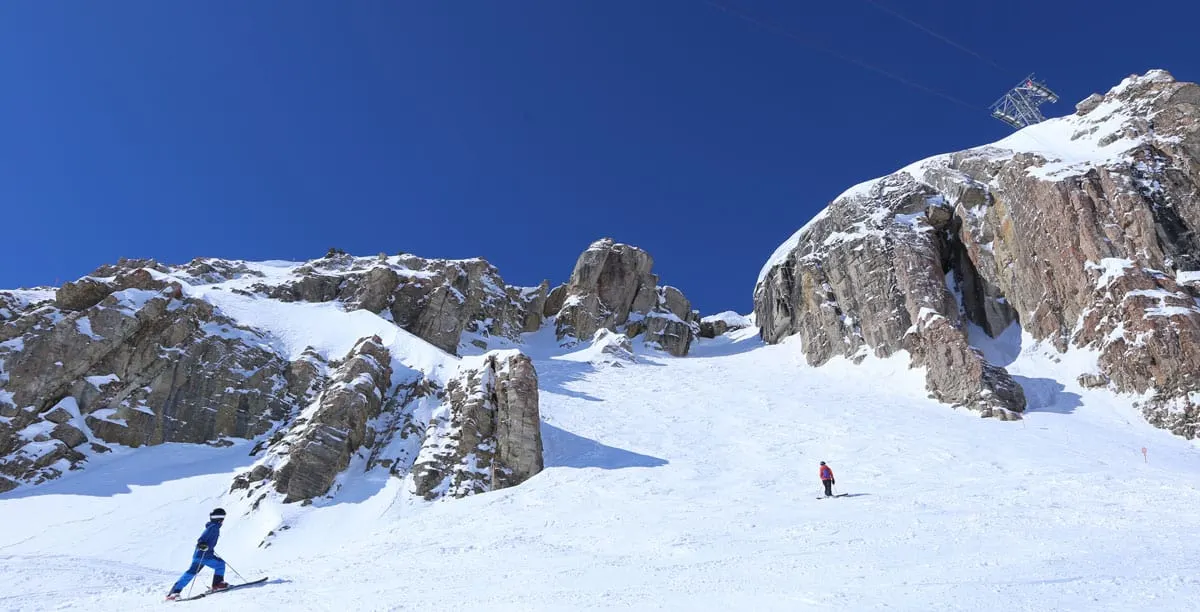 Two people skiing in Jackson Hole.