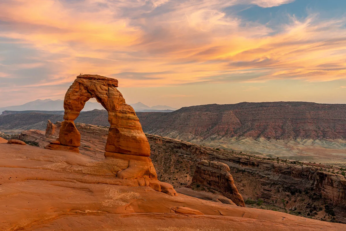 Delicate arch hike at sunset in Moab Utah.