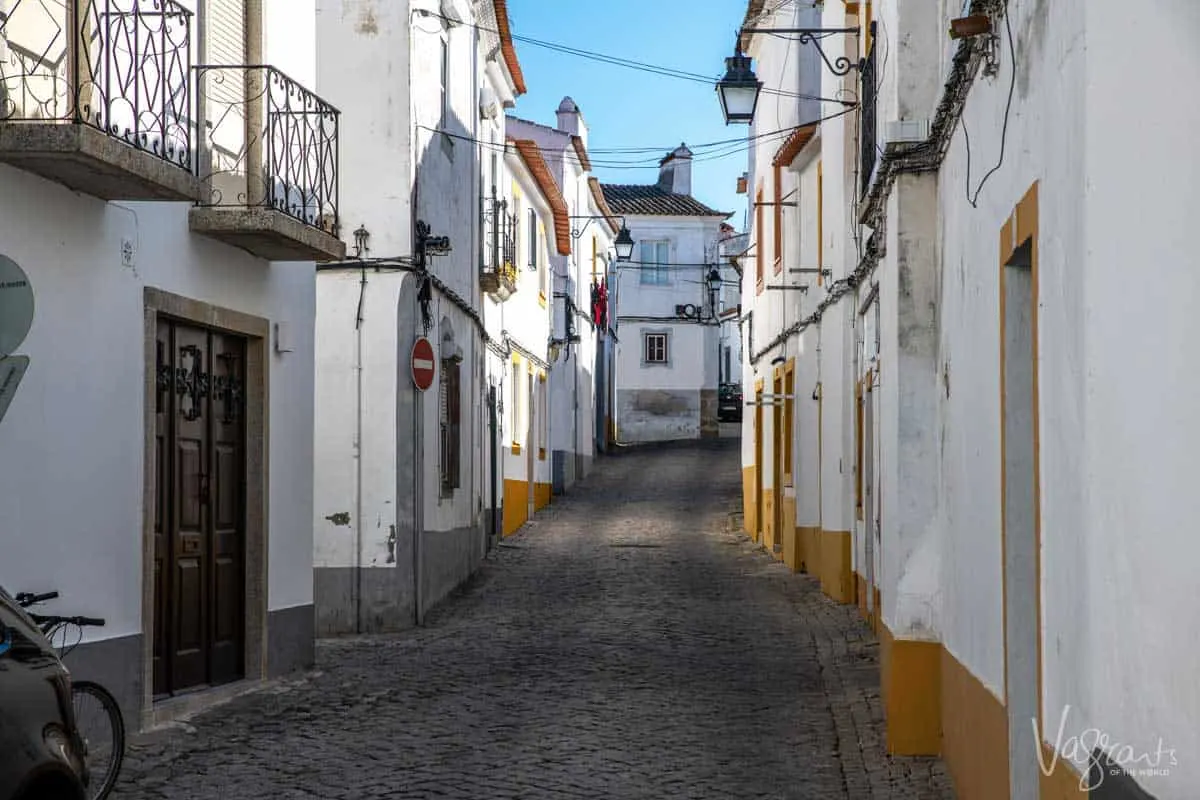 The back streets of Evora old town with typical white houses. 