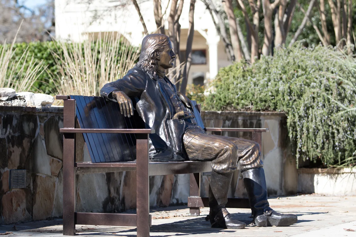 The statue of Wild Bill sitting on a bench in Boerne Texas.