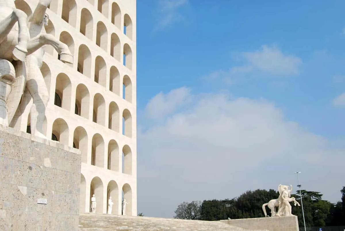 The white marble arched facade of the Palace of Civilisation In the EUR neighbourhood of Rome.