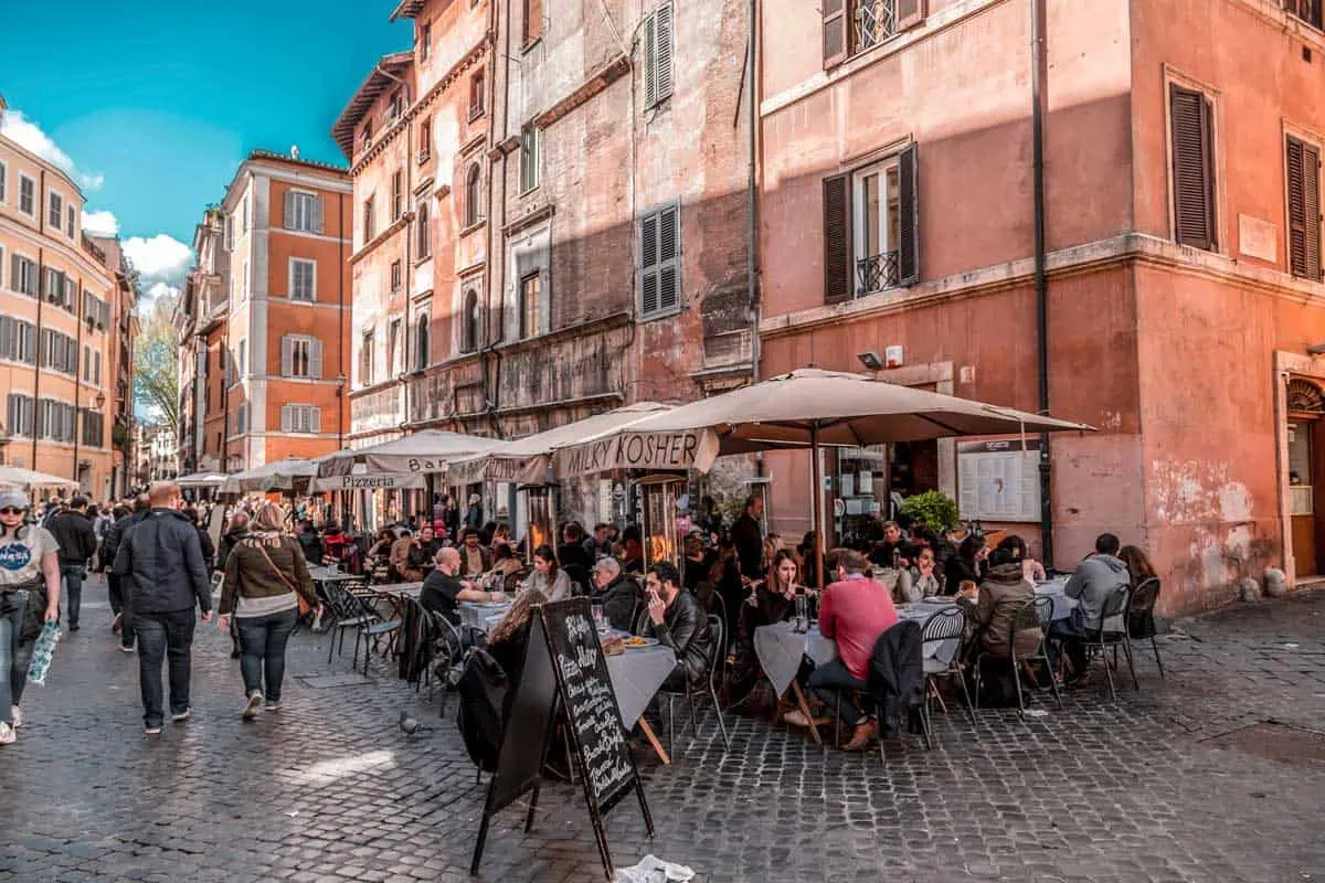 People dining on the street in Kosher restaurants in Rome's Jewish Quarter. 
